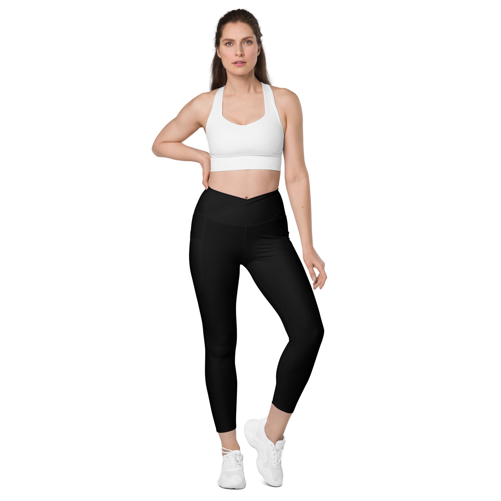 https://www.toneit.ca/cdn/shop/products/all-over-print-crossover-leggings-with-pockets-white-front-632f14132dd86.jpg?v=1664029728